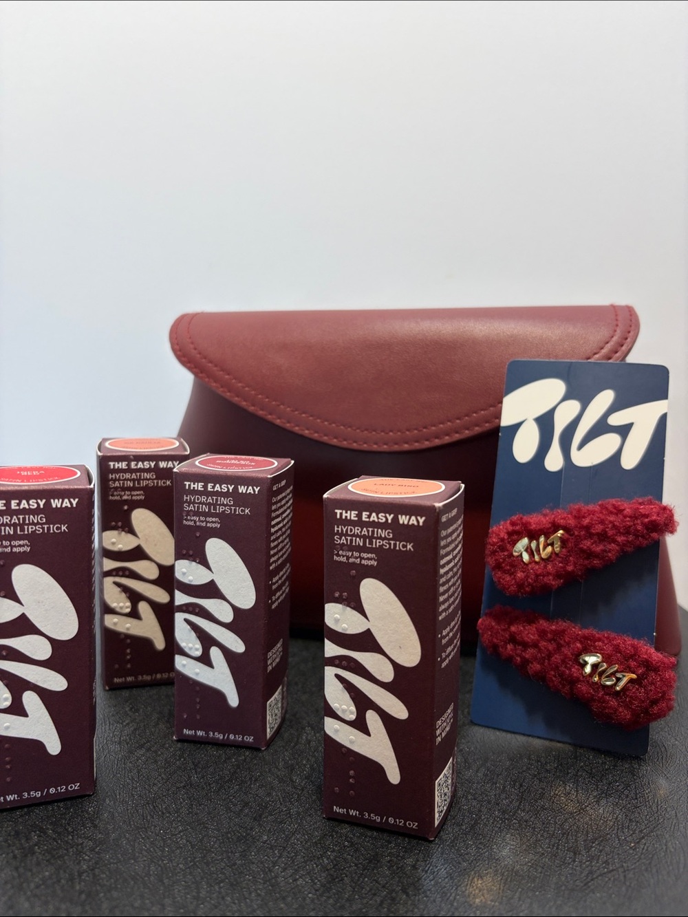 TILT infra red, I’m so Bordeaux, lady bird, ok dahlia satin lipsticks with case